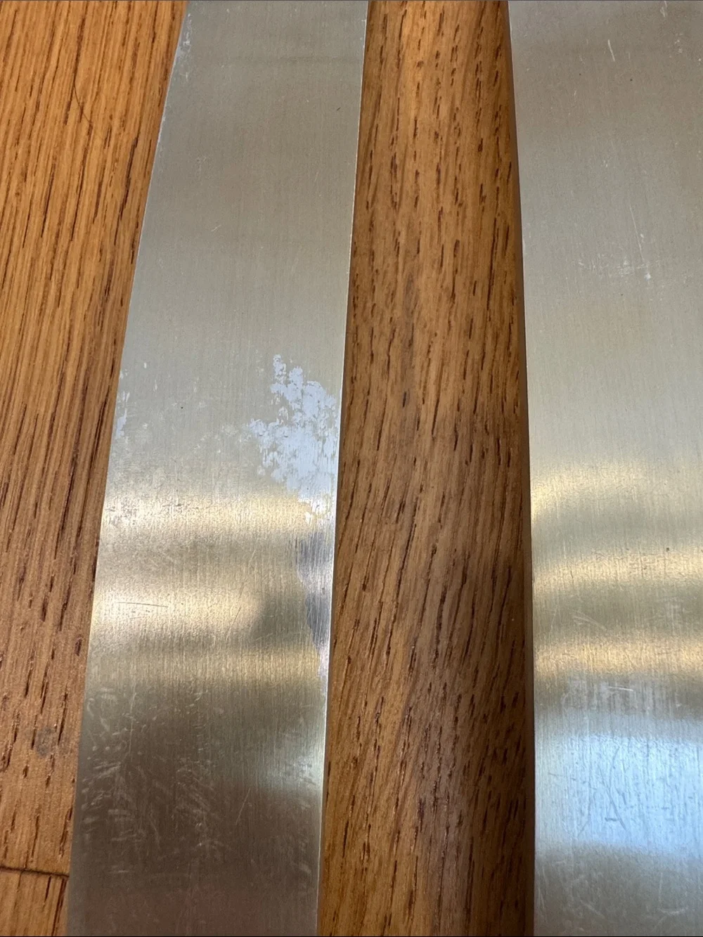 Set of 3 brushed gold Curved wall hangers CB2